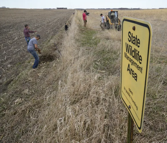 Hands-On Habitat volunteers cleaning up public lands